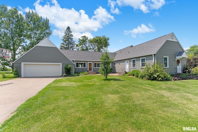 904 W Main St, Reynolds, IL 61279 - single story home featuring a garage, driveway, a front lawn, and roof with shingles