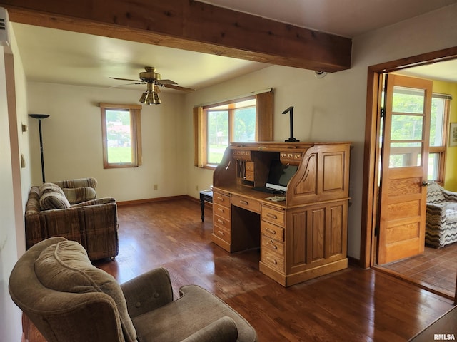 119 9th Ave, Camanche, IA 52730 - living area with dark wood-type flooring, an office area, ceiling fan, and baseboards