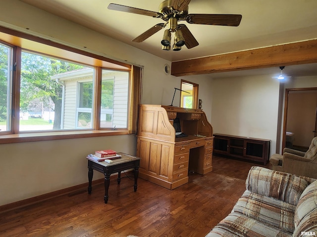 119 9th Ave, Camanche, IA 52730 - sitting room featuring dark wood-style flooring, beamed ceiling, a ceiling fan, and baseboards