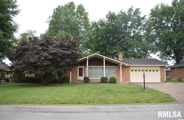 2034 W Wilmar Dr, Quincy, IL 62301 - ranch-style house with an attached garage, a front yard, driveway, and brick siding