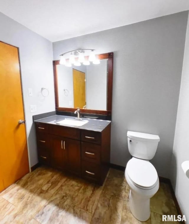 2034 W Wilmar Dr, Quincy, IL 62301 - bathroom featuring toilet and vanity