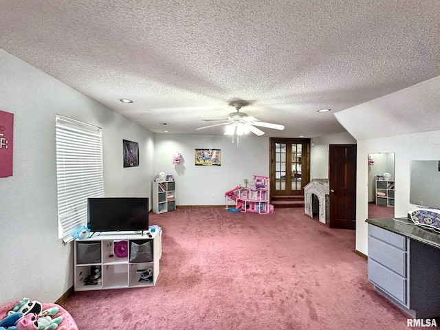 52 Chickasaw St, Mcclure, IL 62957 - playroom with a ceiling fan, carpet flooring, a textured ceiling, and french doors