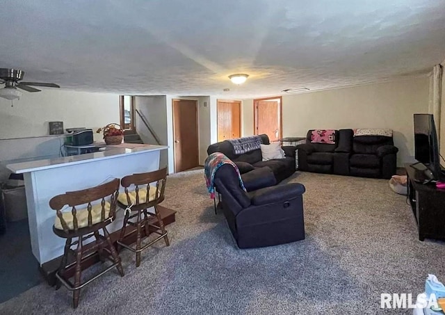 1436 Main Ave, Clinton, IA 52732 - carpeted living area with ceiling fan