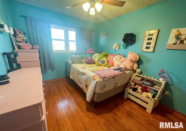 1436 Main Ave, Clinton, IA 52732 - bedroom with hardwood / wood-style floors and ceiling fan