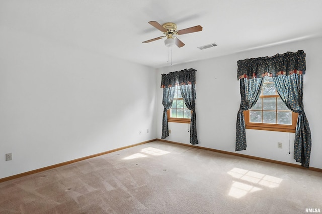 4612 Marquette St, Davenport, IA 52806 - carpeted empty room featuring a ceiling fan and baseboards
