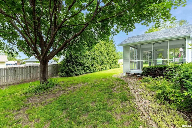 4612 Marquette St, Davenport, IA 52806 - view of yard featuring a sunroom