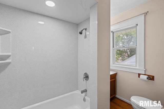 546 21st Ave, Moline, IL 61265 - full bath featuring shower / bath combination, toilet, vanity, and wood finished floors