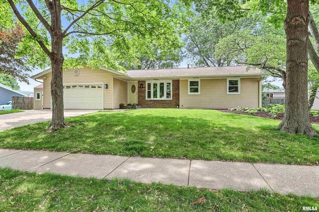 3610 Tam-O-Shanter Dr, Bettendorf, IA 52722 - ranch-style home with an attached garage, concrete driveway, and brick siding