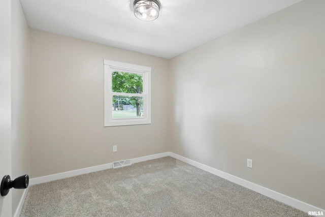 3610 Tam-O-Shanter Dr, Bettendorf, IA 52722 - carpeted empty room with baseboards