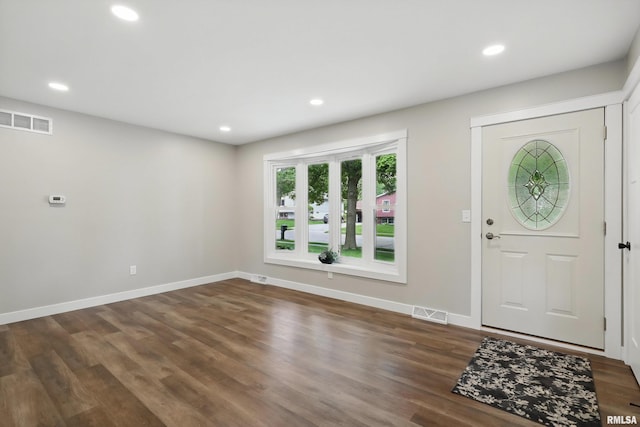 3610 Tam-O-Shanter Dr, Bettendorf, IA 52722 - foyer entrance featuring recessed lighting, wood finished floors, and baseboards