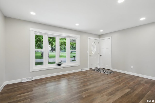 3610 Tam-O-Shanter Dr, Bettendorf, IA 52722 - foyer entrance featuring baseboards, wood finished floors, and recessed lighting