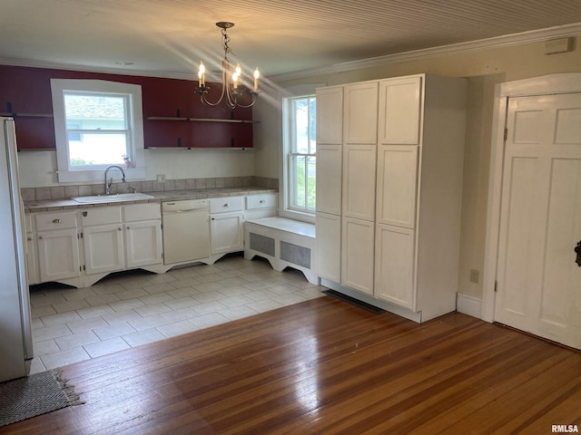 706 N Main St, Port Byron, IL 61275 - kitchen featuring open shelves, white dishwasher, crown molding, white cabinetry, and refrigerator