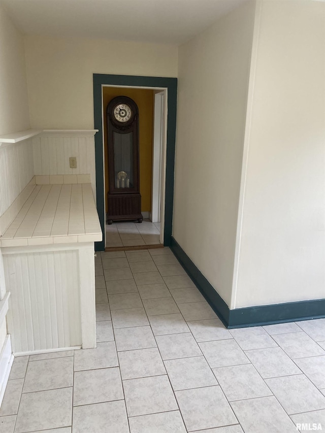 706 N Main St, Port Byron, IL 61275 - hallway with light tile patterned floors