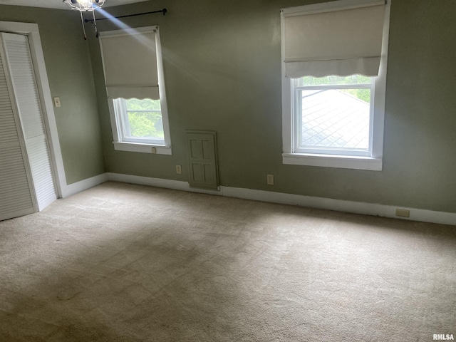 706 N Main St, Port Byron, IL 61275 - bonus room featuring carpet floors and baseboards