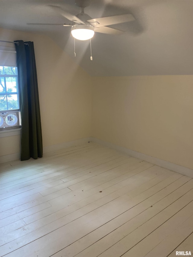 706 N Main St, Port Byron, IL 61275 - additional living space with lofted ceiling, ceiling fan, and light wood-style flooring