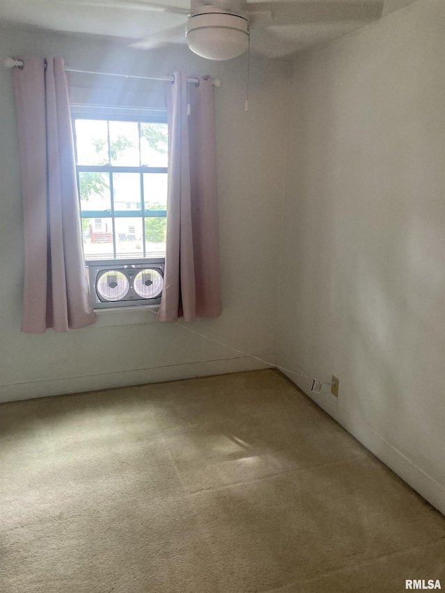706 N Main St, Port Byron, IL 61275 - spare room featuring carpet flooring and a ceiling fan