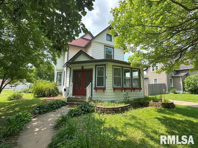 317 9th St, De Witt, IA 52742 - victorian house with french doors