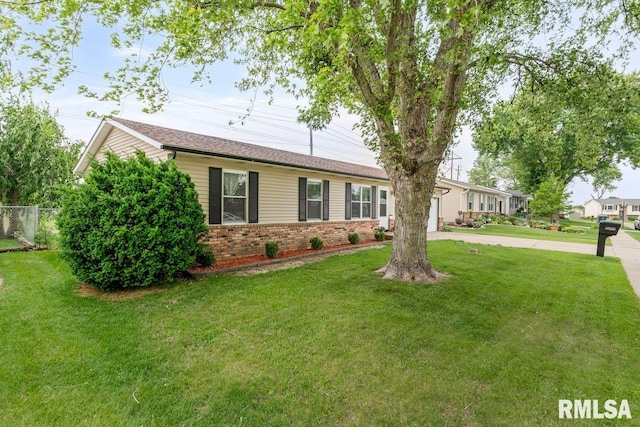 3115 W 63rd St, Davenport, IA 52806 - single story home with concrete driveway, brick siding, and a garage