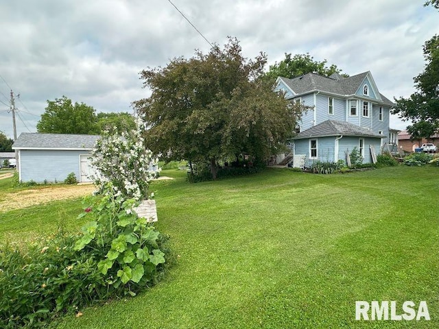 605 Fulton St, Grand Mound, IA 52751 - view of green lawn