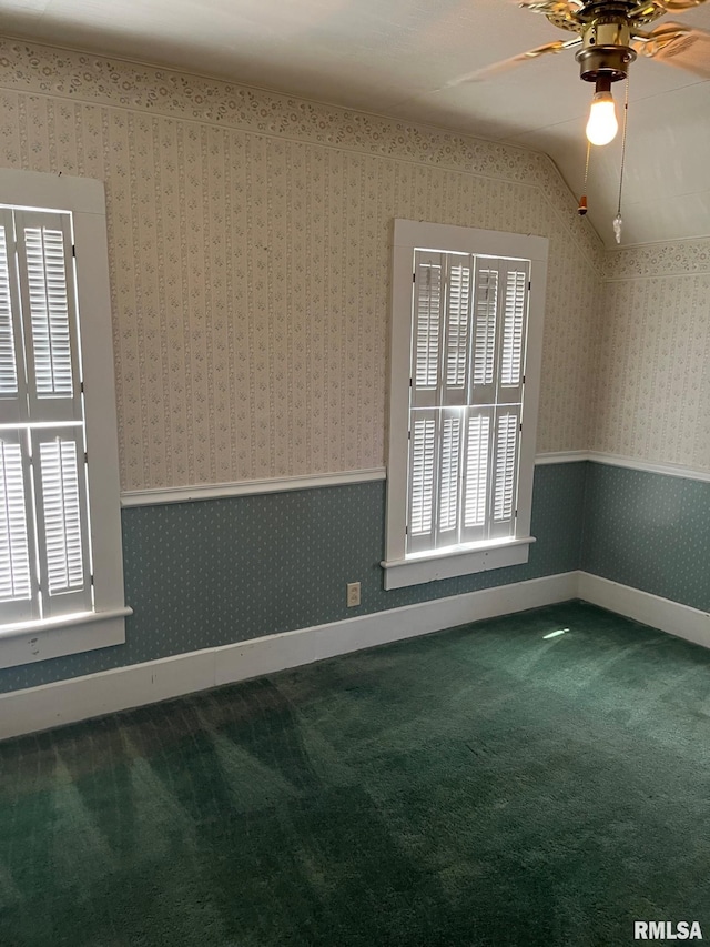 246 Willard St, Kewanee, IL 61443 - carpeted empty room with a ceiling fan, baseboards, and vaulted ceiling