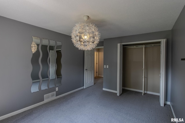 3461 Cedarview Ct, Bettendorf, IA 52722 - unfurnished bedroom with a chandelier, carpet, and baseboards