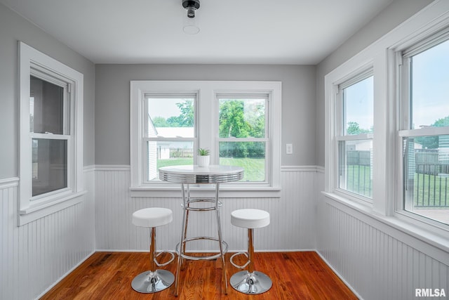 4418 11th St, East Moline, IL 61244 - dining area with a wainscoted wall and wood finished floors