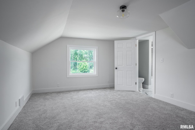 4418 11th St, East Moline, IL 61244 - bonus room featuring carpet flooring, vaulted ceiling, and baseboards