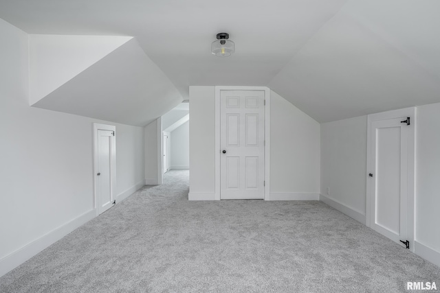 4418 11th St, East Moline, IL 61244 - bonus room featuring carpet flooring, vaulted ceiling, and baseboards