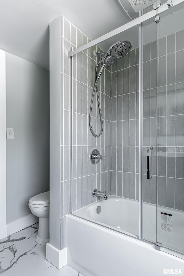 4418 11th St, East Moline, IL 61244 - bathroom with toilet, enclosed tub / shower combo, baseboards, and marble look tile flooring