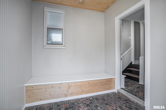 4418 11th St, East Moline, IL 61244 - mudroom featuring brick patterned flooring and wood walls