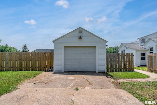 4418 11th St, East Moline, IL 61244 - detached garage featuring concrete driveway