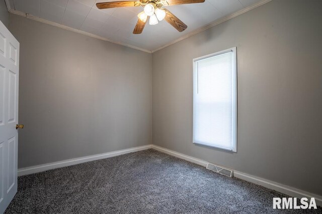 710 S Bentley St, Marion, IL 62959 - empty room featuring ornamental molding, carpet, ceiling fan, and baseboards