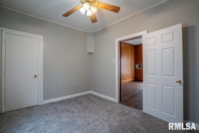 710 S Bentley St, Marion, IL 62959 - carpeted spare room featuring ornamental molding, ceiling fan, and baseboards