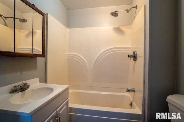 710 S Bentley St, Marion, IL 62959 - bathroom featuring vanity, toilet, and tub / shower combination