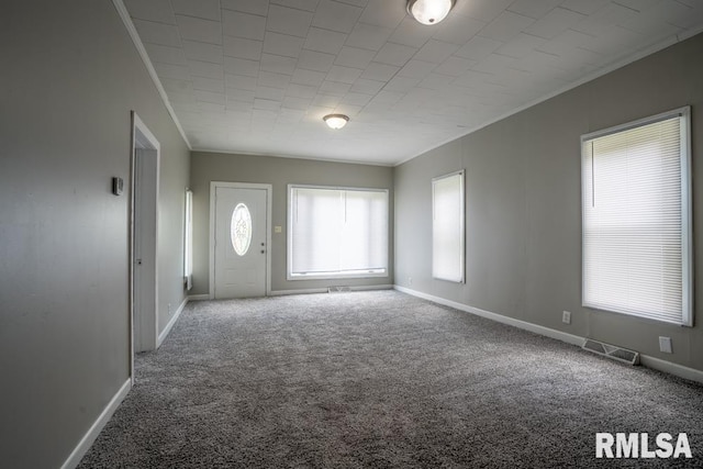 710 S Bentley St, Marion, IL 62959 - foyer featuring crown molding, carpet floors, and baseboards