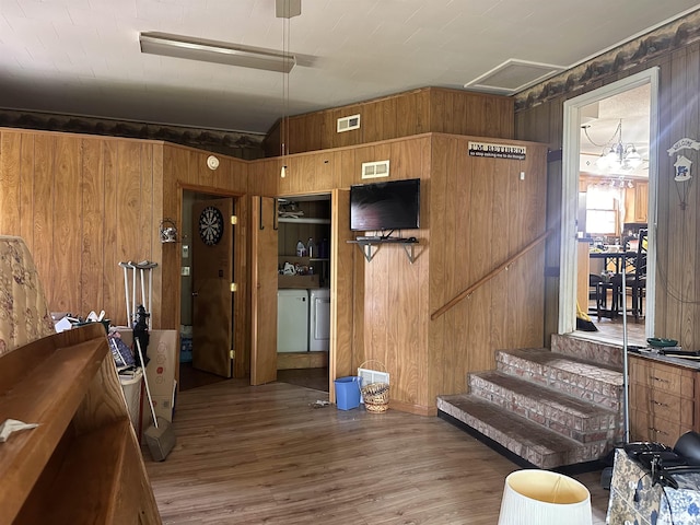 690 Railroad St, Tamms, IL 62988 - interior space with wood finished floors and wooden walls