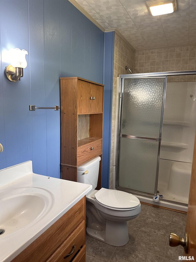 690 Railroad St, Tamms, IL 62988 - bathroom featuring a stall shower, toilet, and vanity
