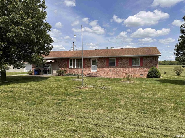 690 Railroad St, Tamms, IL 62988 - rear view of house with brick siding, a lawn, and entry steps