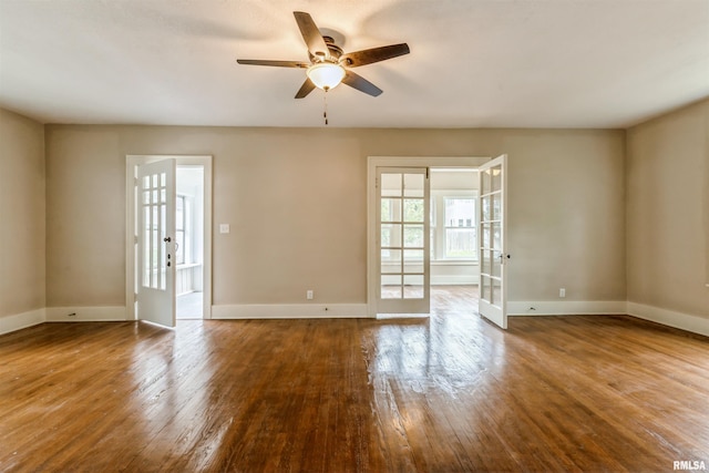 2037 18th St Unit B, Moline, IL 61265 - empty room featuring a ceiling fan, wood finished floors, and baseboards