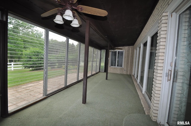 18616 N 35th Ave, East Moline, IL 61244 - unfurnished sunroom with a ceiling fan