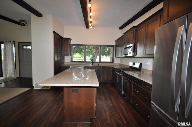 18616 N 35th Ave, East Moline, IL 61244 - kitchen with appliances with stainless steel finishes, dark wood finished floors, a kitchen island, dark brown cabinets, and beamed ceiling