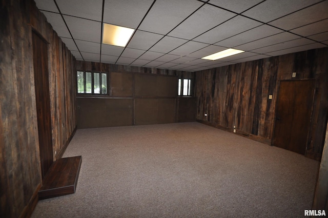 18616 N 35th Ave, East Moline, IL 61244 - basement with wooden walls, carpet floors, and a drop ceiling
