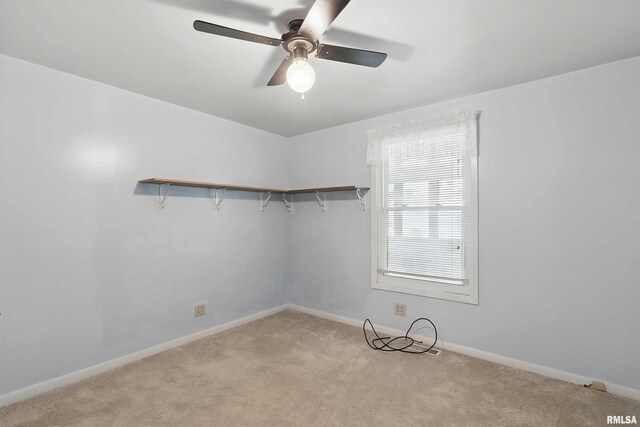 2947 12th Ave, Moline, IL 61265 - unfurnished room with ceiling fan, light carpet, and baseboards