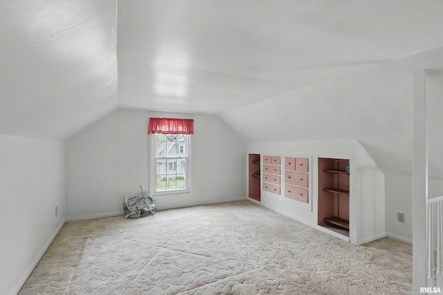 2947 12th Ave, Moline, IL 61265 - bonus room with carpet, vaulted ceiling, and baseboards