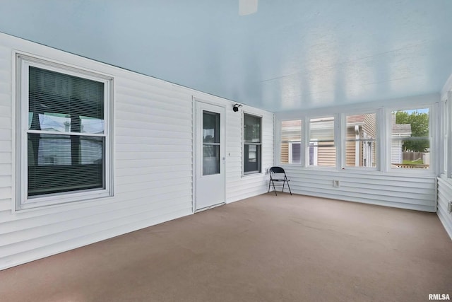 2947 12th Ave, Moline, IL 61265 - unfurnished sunroom featuring carpet