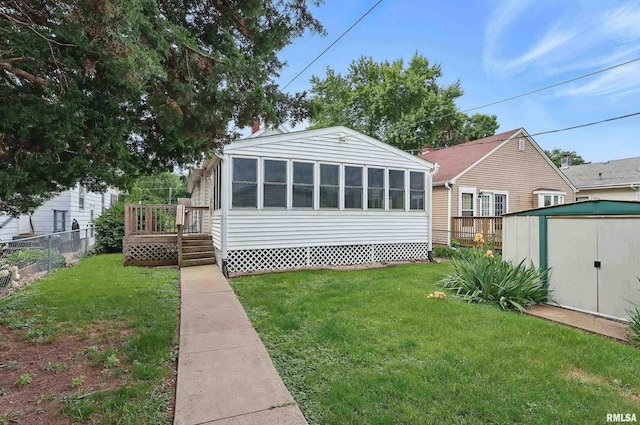 2947 12th Ave, Moline, IL 61265 - back of house featuring a deck