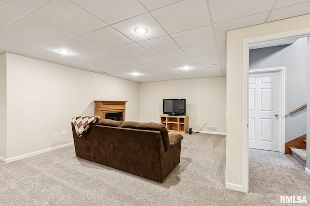 308 N 9th Ave N, Fulton, IL 61252 - living area featuring carpet floors, a fireplace, stairs, baseboards, and recessed lighting