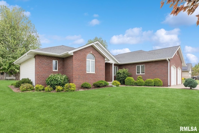 308 N 9th Ave N, Fulton, IL 61252 - ranch-style home featuring brick siding, a front lawn, an attached garage, and a shingled roof