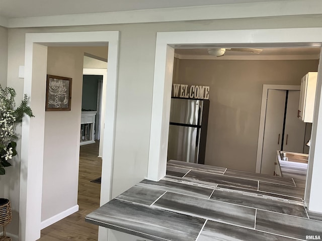 136 W Mill St, Kewanee, IL 61443 - hallway featuring dark wood-style floors and baseboards
