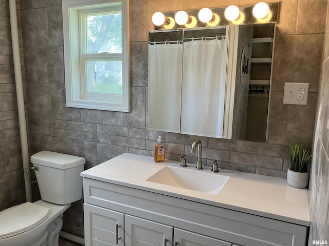 136 W Mill St, Kewanee, IL 61443 - bathroom featuring vanity and toilet